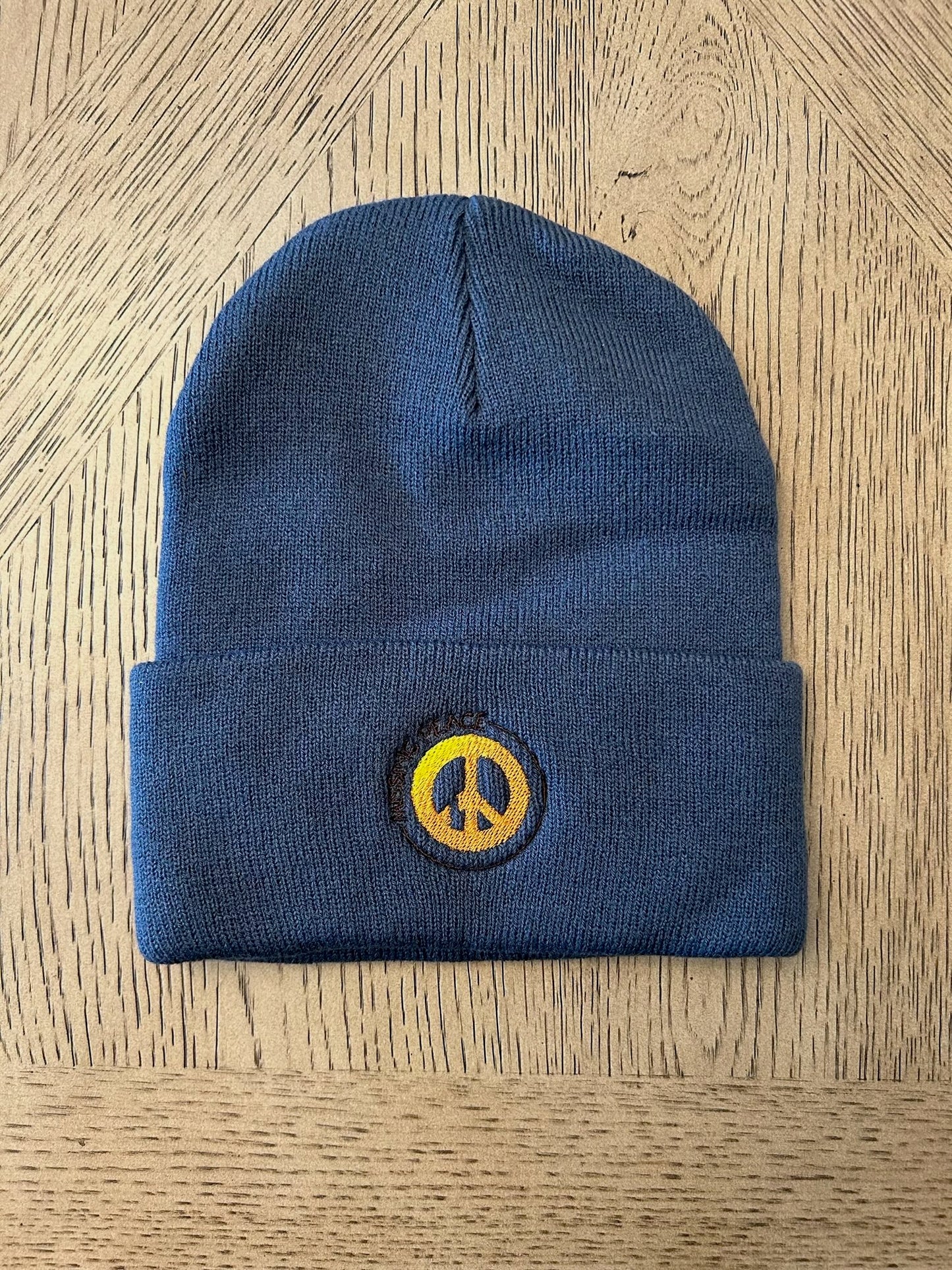MISSING PEACE BEANIE / MILLENNIUM BLUE - with original missing peace logo embroidered in our beautiful TRI-COLOR logo